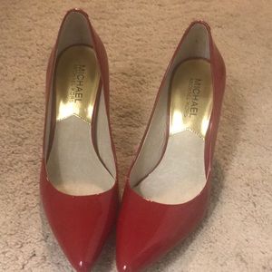 Michael Kors red patent shoes